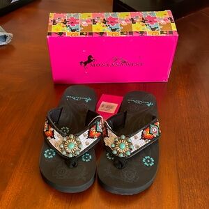 New with box. Montana West flip flops